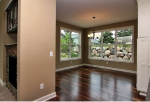 Living room and dining room separated by a fireplace