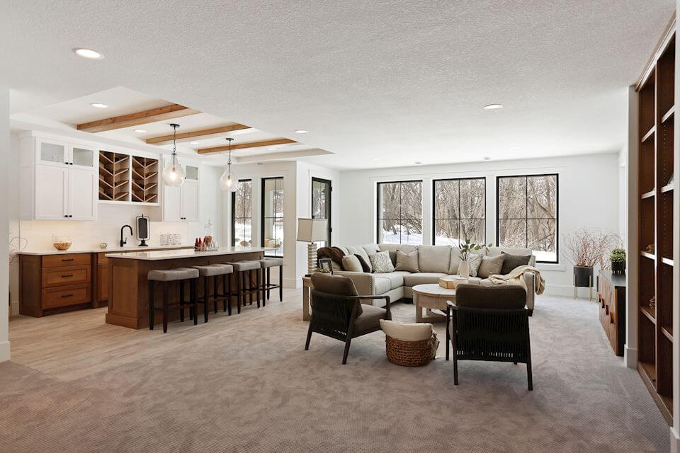 Basement wet bar and living area.